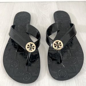 Tory Burch Sandals size 8, some wear on the logo (see picture)